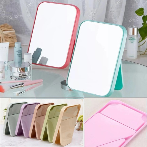 Square shaped hand held mirror - hand,